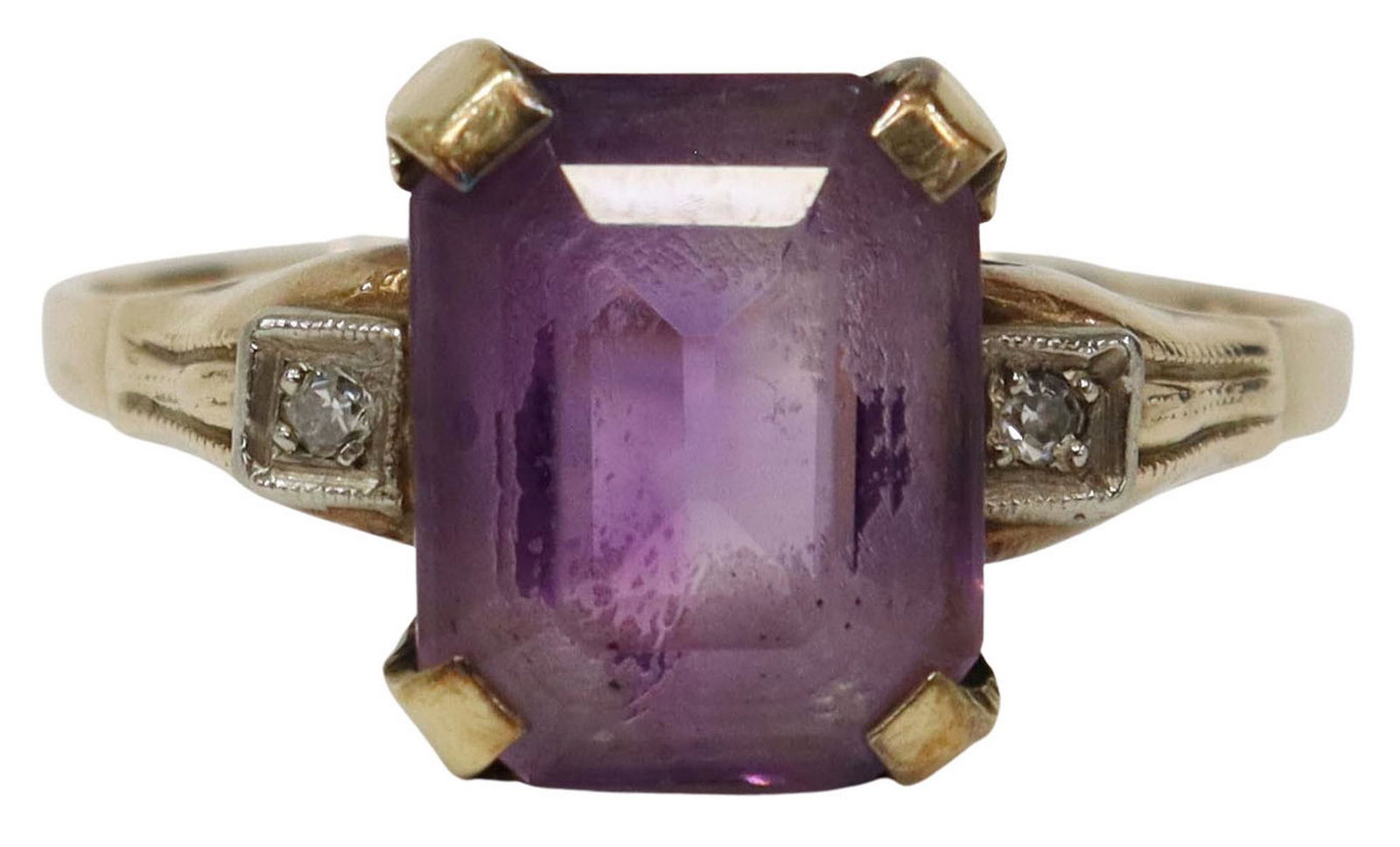 ESTATE 14KT YELLOW GOLD AMETHYST & DIAMOND RING: Estate 14kt yellow gold ring, octagon-cut amethyst framed by two small diamonds at the shoulders, inside shank stamped 14K, approx size 8.75, 2.3 grams (inclusive of all materials) Start Price: $125.0