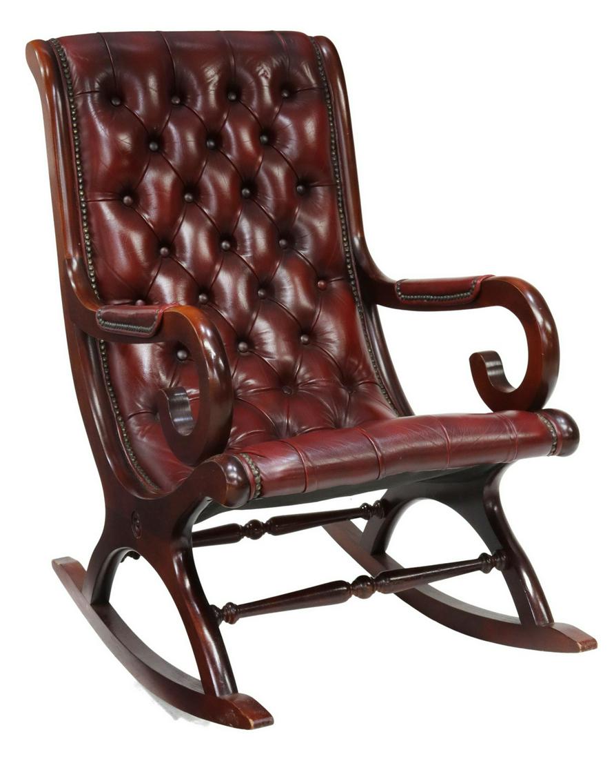 CAMPECHE STYLE TUFTED LEATHER ROCKING CHAIR: Campeche style rocking chair, late 20th c., mahogany frame, oxblood leather upholstery, button-tufted back and seat, brass tack trim, scrolled arms, x-form base joined by turned stretchers, on rocker 