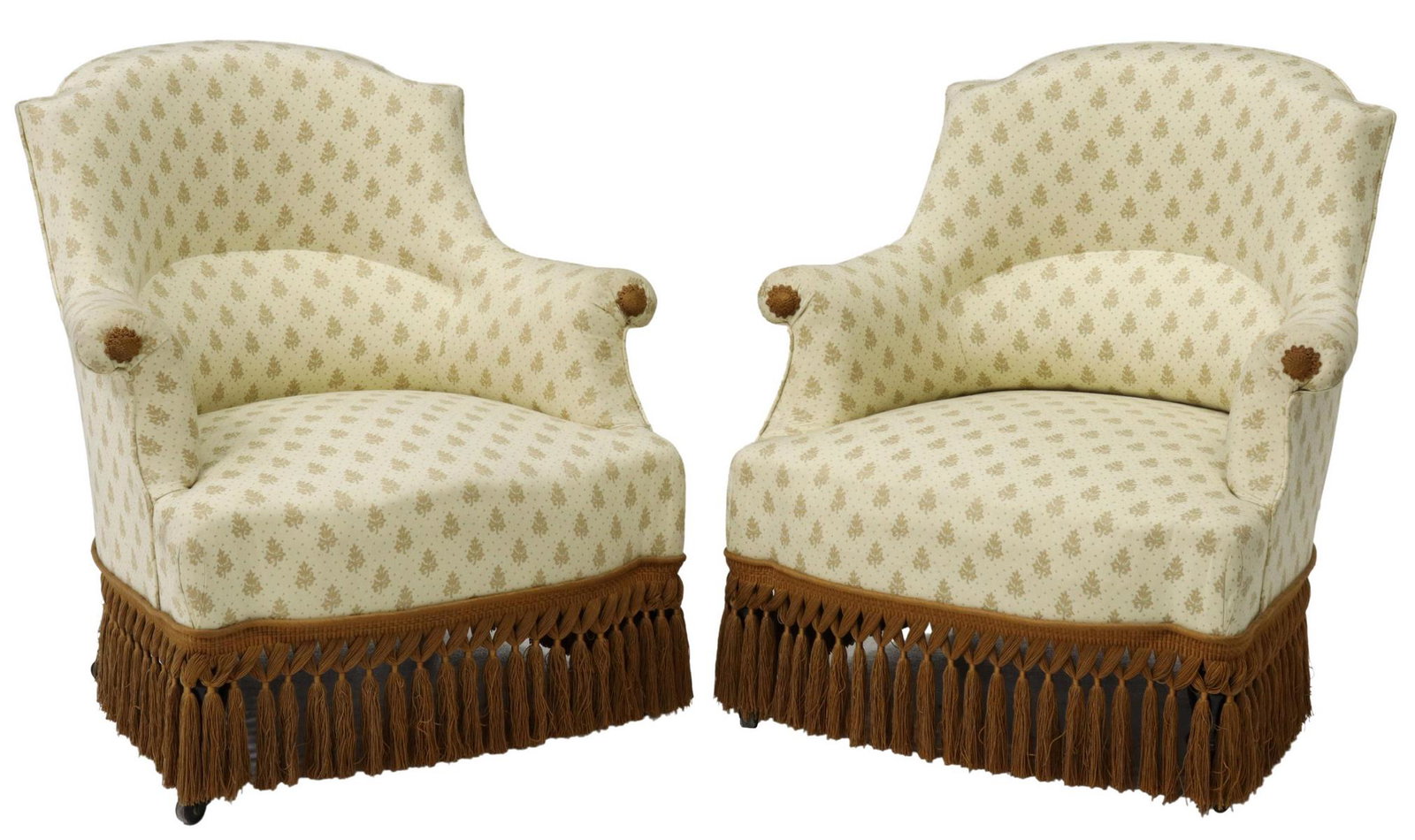 (2) FRENCH NAPOLEON III PERIOD SLIPPER BERGERES: (pair) French Napoleon III period slipper armchairs, late 19th c., upholstered in foliate and dot pattern textile, fixed with piping trim, accented with woven cord hand holds and long knotted fringe, 
