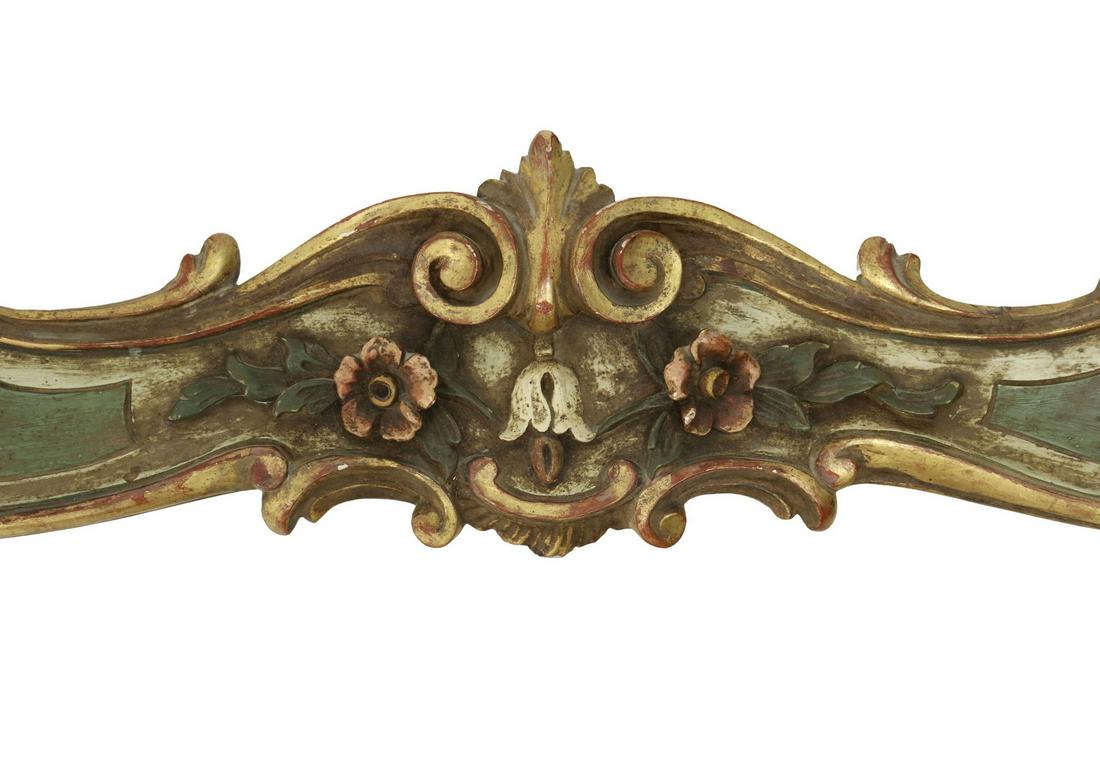 ITALIAN BAROQUE STYLE PARCEL GILT VALANCE PELMET: Italian Baroque style parcel gilt and painted valance/ pelmet, 20th c., central floral blooms framed by scrolls, approx 8.5"h, 75.75"l, 9.5"d Start Price: $100.00