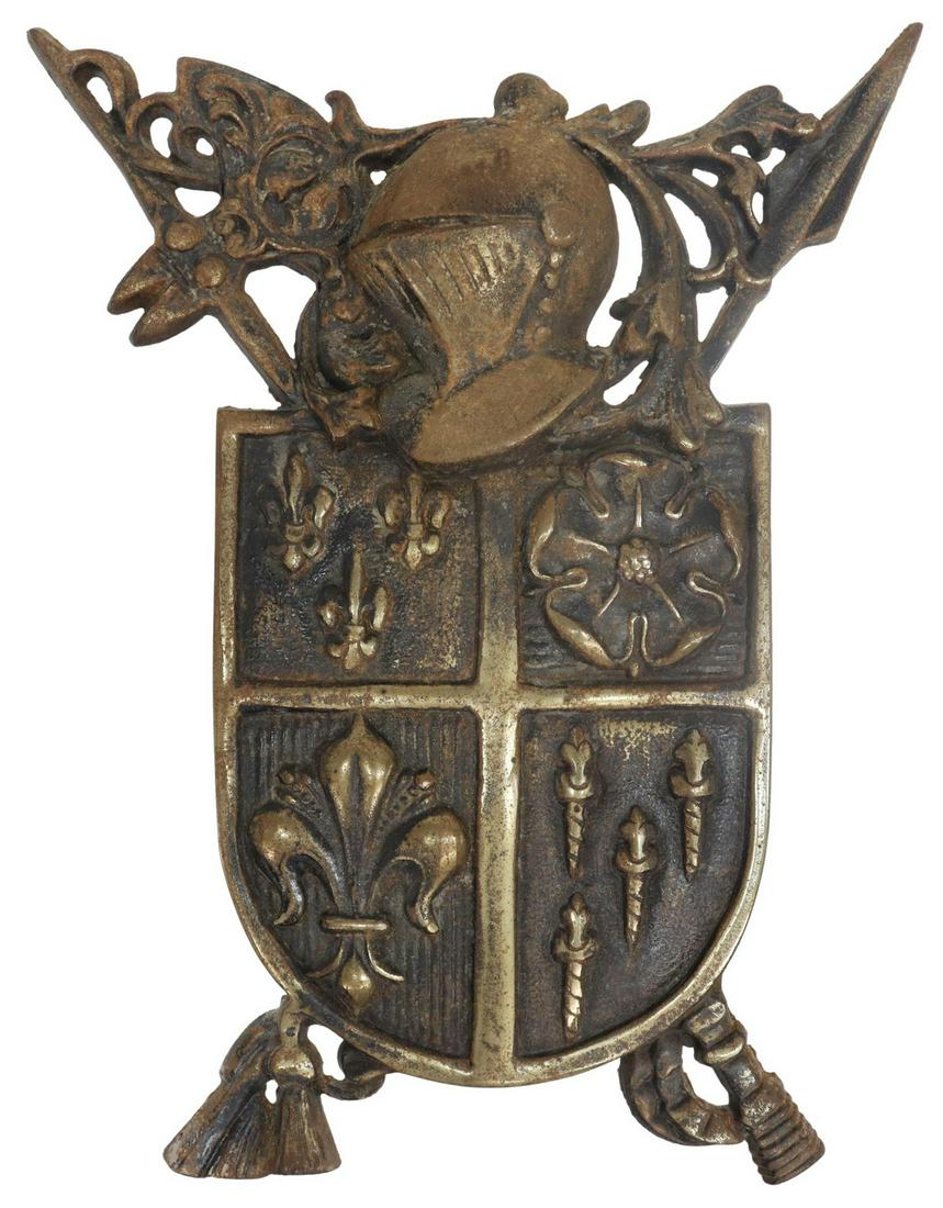 CAST METAL HERALDIC COAT OF ARMS: Cast metal coat of arms, crossed spear and battle axe, close helm above divided shield, with fleurs-de-lis and rose, approx 15"h, 11.25"w, 5.75lbs Start Price: $100.00