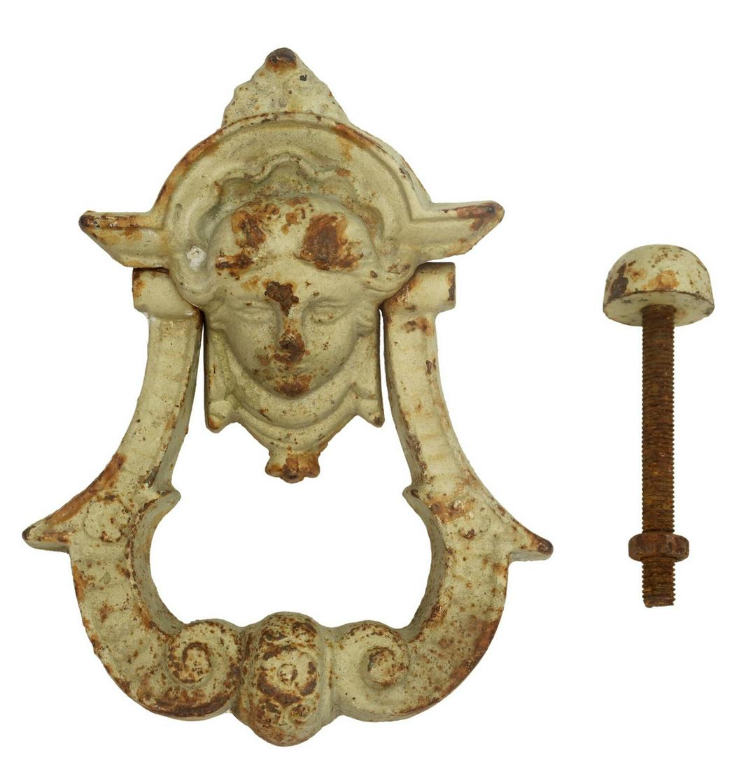 ARCHITECTURAL PAINTED CAST IRON DOOR KNOCKER: Painted cast iron door knocker, 19th c., with female mask, u-shaped ring, approx 9.5"h, 7.5"w, 8lbs Start Price: $100.00