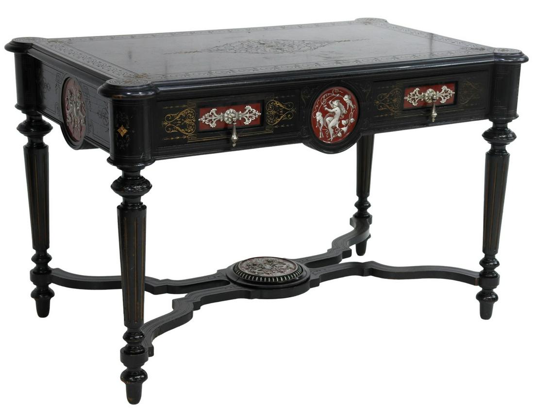 EXCEPTIONAL FRENCH NAPOLEON III EBONIZED DESK: Exceptional French Napoleon III period ebonized oak writing desk, late 19th c., ornamented throughout with incised and parcel gilt foliate scroll pattern, featuring inset polychrome enameled panels wi