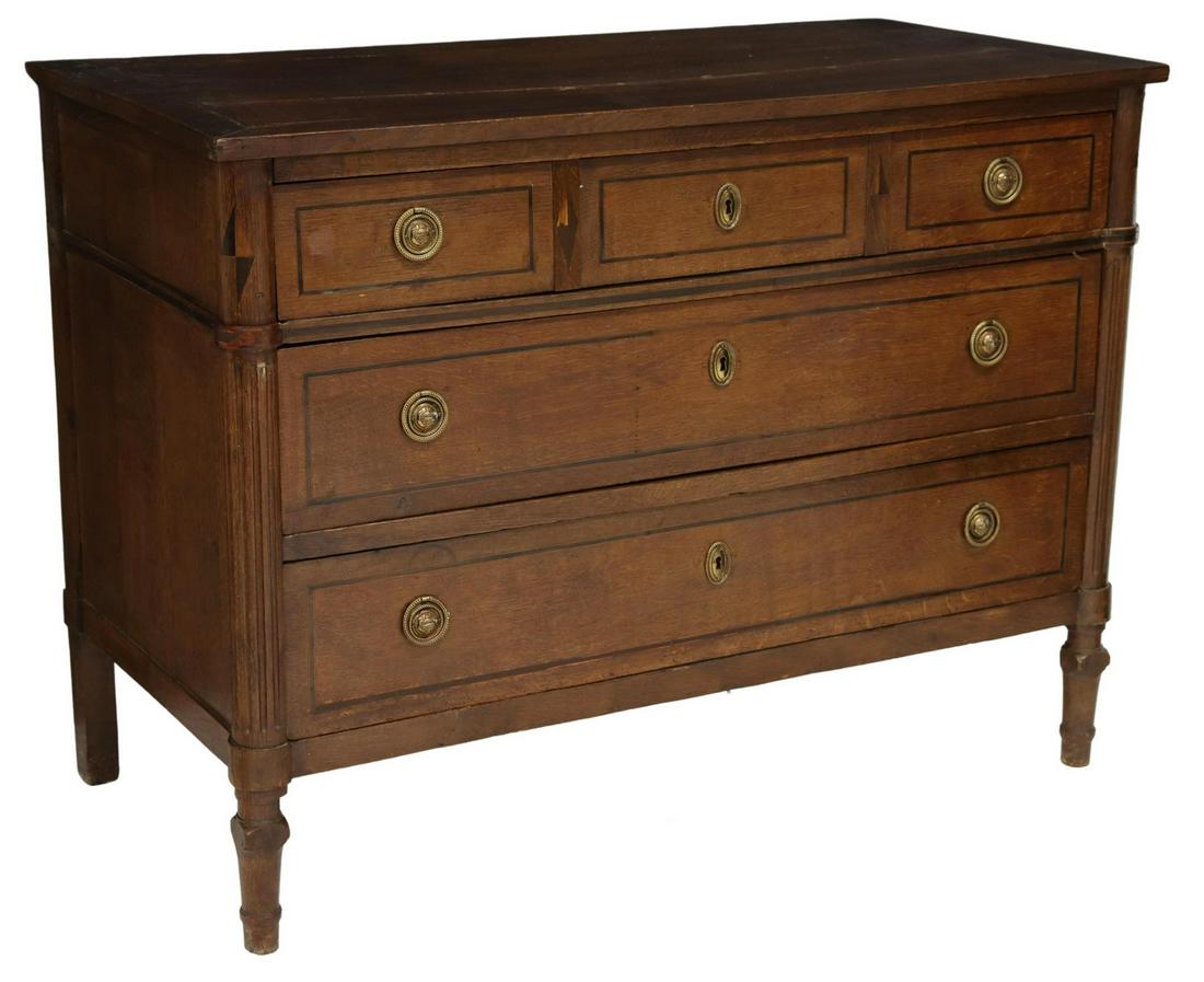 FRENCH LOUIS XVI STYLE OAK THREE-DRAWER COMMODE: French Louis XVI style oak commode, 19th c., three drawers, rising on tapered turned legs, approx 32"h, 43"w, 21.5"d Start Price: $600.00