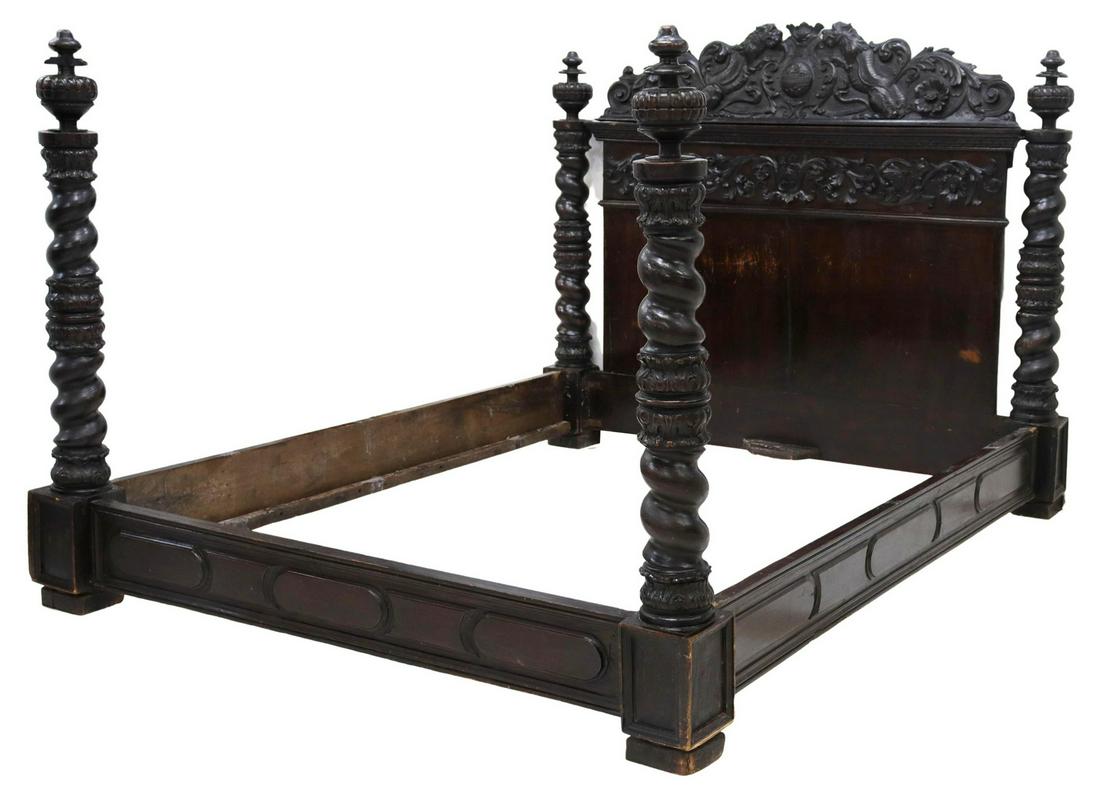 CONTINENTAL BAROQUE STYLE CARVED WALNUT BED: Continental Baroque style walnut bed, 19th c., carved crest with opposing lions flanking a cartouche shield, over scrolling foliage, Solomonic column posts, rising on block feet, showing wear, old woo