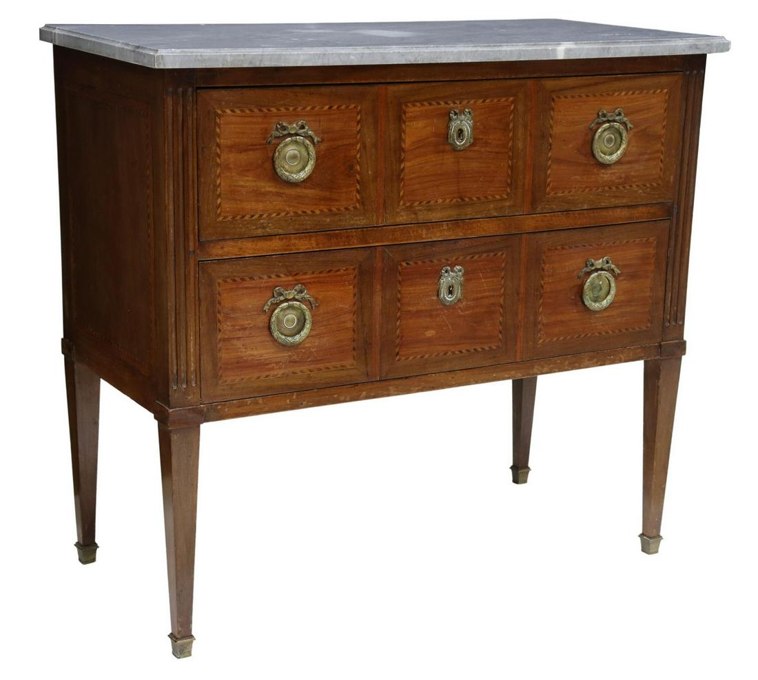 FRENCH LOUIS XVI STYLE MARBLE-TOP MAHOGANY COMMODE: French Louis XVI style marble-top mahogany commode, early 20th c., case fitted with two drawers, wreath and ribbon gilt metal pulls and escutcheons, contrasting banded inlay, fluted corner posts, risi