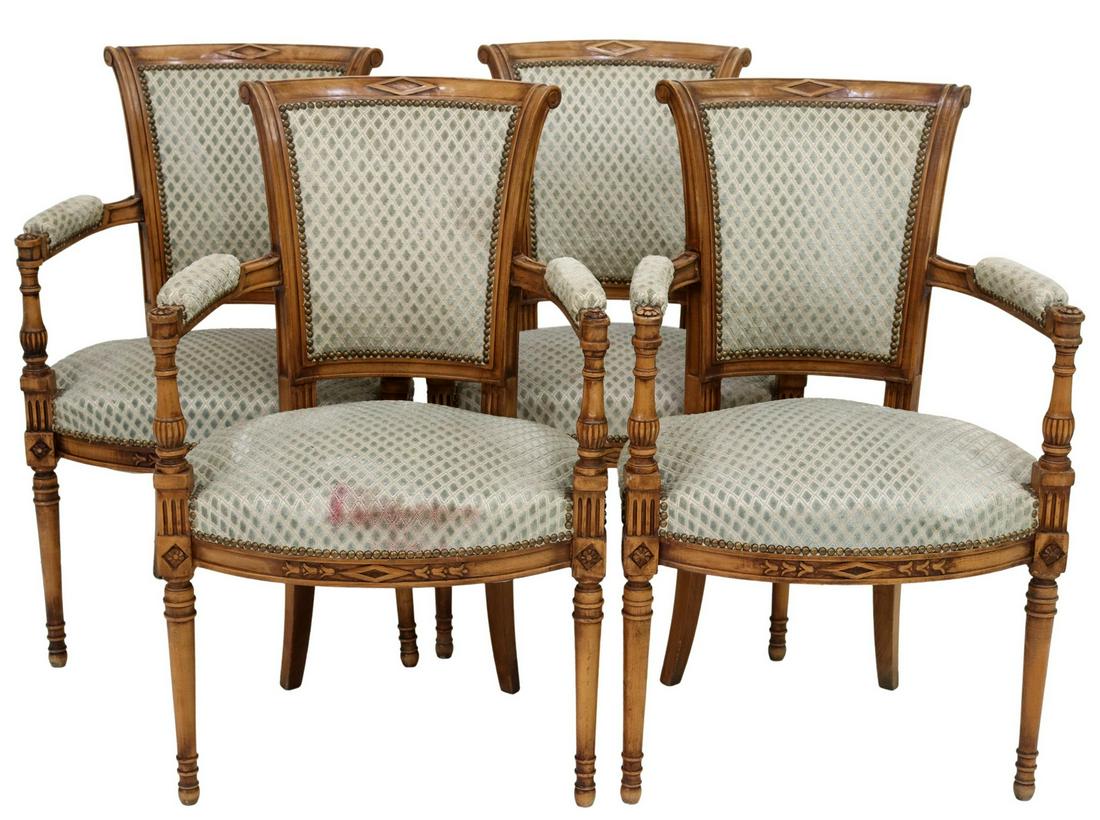 (4) FRENCH LOUIS XVI STYLE UPHOLSTERED FAUTEUILS: (lot of 4) French Louis XVI style armchairs, 20th c., frame in a fruitwood finish, cut diamond patterned upholstery, with tack trim, rising on tapered legs, approx 35.75"h, 22.5"w, 19"d, seat height: 