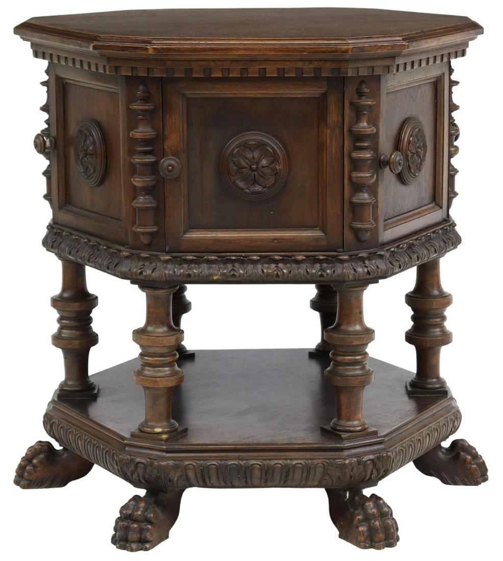 ITALIAN RENAISSANCE REVIVAL WALNUT SIDE TABLE: Italian Renaissance Revival walnut side table, early 20th c., twelve-sided top, six cabinet doors, open interior, turned supports, joined by lower tier, ending in carved paw feet, approx 26.25"h, 26.5
