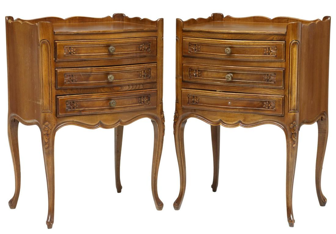 (2) LOUIS XV STYLE WALNUT NIGHTSTANDS: (pair) Louis XV style walnut nightstands, 20th c., three-quarter gallery, over three drawers, rising on cabriole legs, ending in whorl feet, approx 27"h, 18"w, 14.5"d Start Price: $150.00