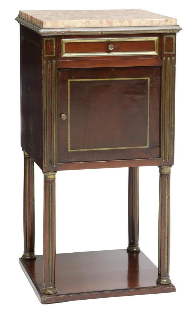FRENCH EMPIRE STYLE MAHOGANY BEDSIDE CABINET: French Empire style mahogany bedside cabinet, early 20th c., having marble top, one drawer, above one door with interior marble liner, metal trim throughout, rising on four legs joined by lower shelf,