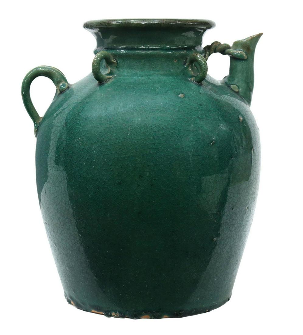 CHINESE GLAZED EARTHENWARE WINE EWER: Chinese earthenware wine ewer, in green glaze, having short spout, handle, ringed collar, intact with hairline running underfoot to body, approx 14"h, 11.25"diam, 16lbs Start Price: $60.00