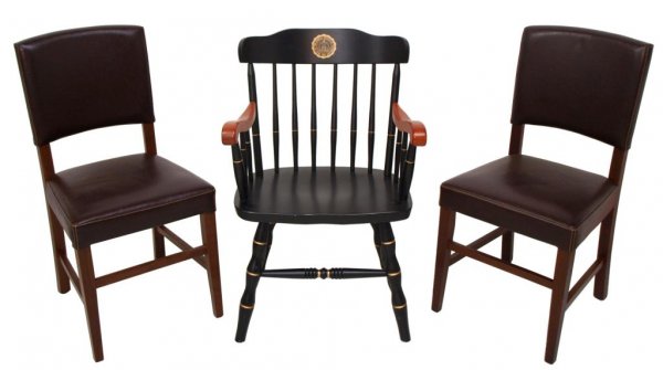 BOONE IND UNIVERSITY CAPTAINS CHAIR & SIDE CHAIRS: (lot of 3) Chairs: (pair) contemporary side in a brown leather-like upholstery, 35"h, 18"w, 17"d; (1) Boone Industries, NC, captain's arm chair in a black satin lacquer with cherry tinted arms, "Seal 