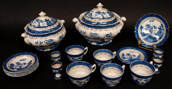 (18) BOOTHS BLUE WILLOW TUREENS, PLATES, CUPS: (lot of 18) Booths blue willow china, most with post 1912 mark "Real Old Willow": (2) tureens, one intact with restoration at lid finial, no chips or cracks visible under black light examination, larg