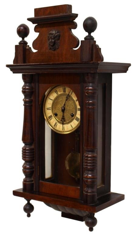 ANTIQUE GERMAN WALL CLOCK, JUNGHANS: German walnut cased wall clock, works stamped with the eight point star "I" mark of Junghans,Wuerttemberg, porcelain dial, Roman numerals, 24"h, 11.5"w, 6"d, 8lbs (DR)