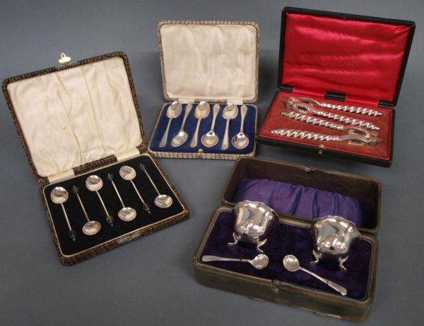 ANTIQUE CASED BIRMINGHAM STERLING SALTS & SPOONS: (3 sets) Cased Birmingham sterling silver tableware comprising: J. Gloster Ltd. footed salts, each with original spoon, c. 1910, in original leather case, 2"h, 6.25"l, 3"d; (6) Walker & Hall demitasse