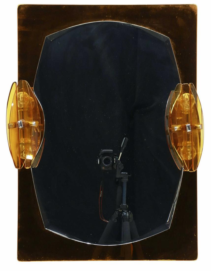 ITALIAN MID-CENTURY BATHROOM MIRROR & SCONCES: Italian mid-century modern bathroom mirror, attributed to Veca, c.1960s, orange glass frame, shaped and beveled mirror plate, flanked by two-light sconces, sconces in need of wiring, mirror: approx 32