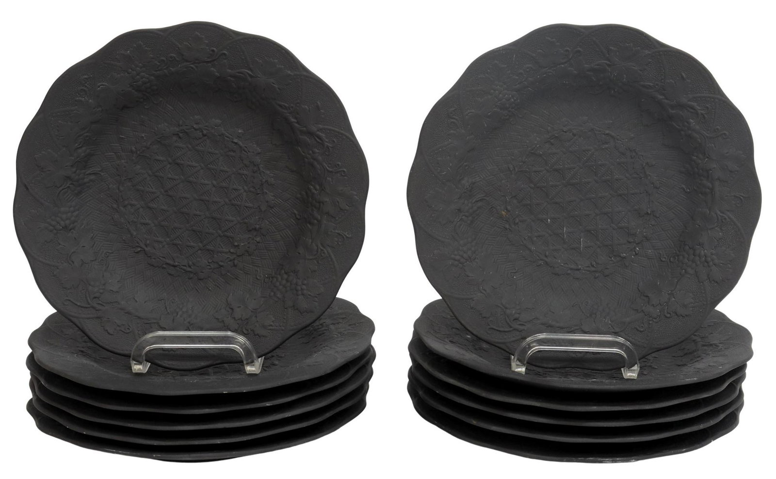 (12) WEDGWOOD BLACK BASALT GRAPEVINE SALAD PLATES: (lot of 12) English black basalt salad plates, Wedgwood, grapevine pattern around scalloped edges with lattice basket decoration in roundel, (two) plates with chips to rim, approx 8.5"diam; 12.25lbs t