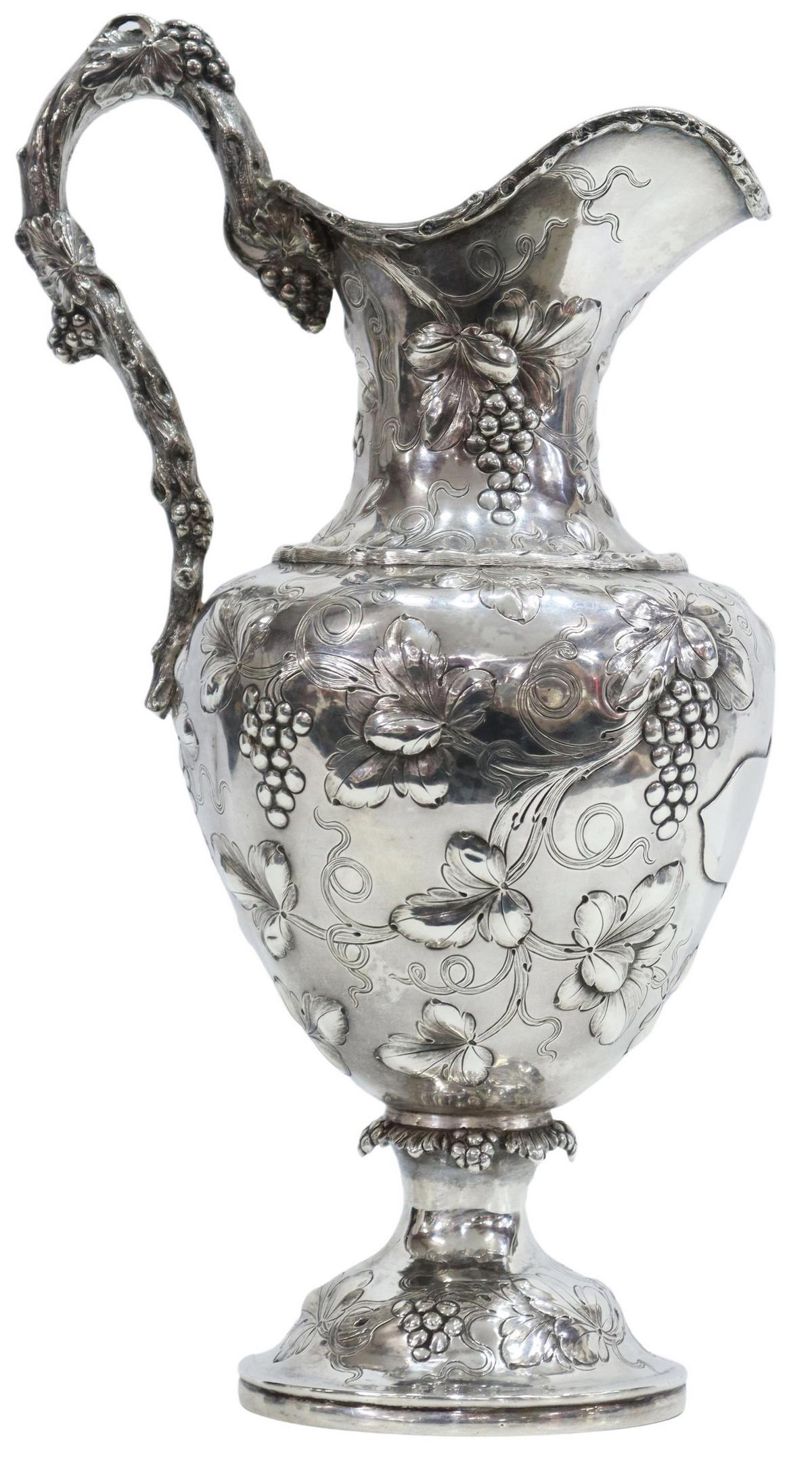 GREGG HAYDEN & CO CHARLESTON COIN SILVER WINE EWER: American Victorian coin silver wine ewer, Gregg, Hayden and Company, Charleston, South Carolina, mid 19th c., helmet-form spout, handle modeled as a naturalistic grapevine, body with repousse grape cl