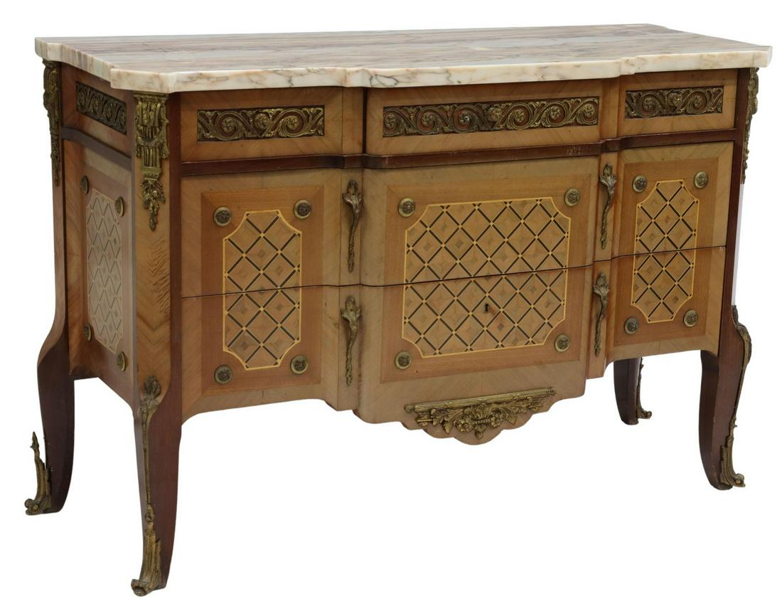 FRENCH LOUIS XV STYLE MARBLE-TOP MAHOGANY COMMODE: French Louis XV style marble-top mahogany commode, 20th c., having three gilt scrolled accessory drawers, rising above two dresser drawers with inlaid diamond marquetry, terminating in French bracket 