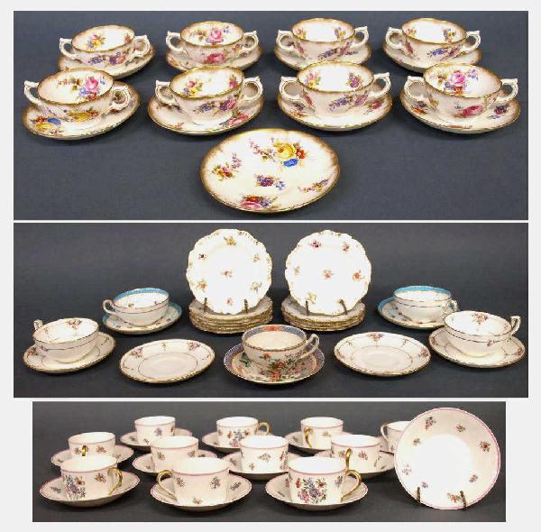 MINTONS & OTHER PORCELAIN TABLEWARE, TIFFANY & CO: (lot of 62) Collection of assorted English and French porcelain cups, saucers, and other tableware comprising: (2) English Mintons cups with (2) saucers, each with hand painted roses and raised enamel