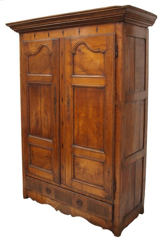 ANTIQUE FRENCH INLAID CHERRYWOOD ARMOIRE: Petite French inlaid cherrywood armoire, late 18th c., a projecting cornice surmounting the frieze and central support inlaid with diamond patterns, two paneled doors above a single carved drawer and 