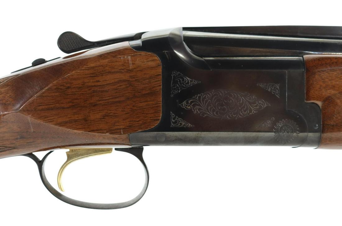 BROWNING CITORI O/U 12 GAUGE SHOTGUN: Browning Citori Over Under shotgun, Japan, 12 gauge, 28" vent rib modified choke barrels, 2.75" and 3' chambers, foliate engraved receivers, gilt trigger, gloss checkered stock, bright bores, no dents