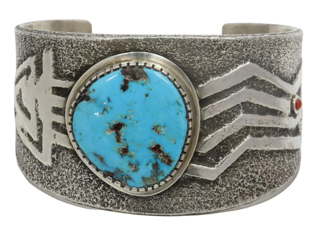 ROBERT SORRELL NAVAJO TUFA CAST SILVER CUFF: Native American silver (content unknown) cuff bracelet, Robert Sorrell (Navajo/ Dine, 20th c.), tufa cast cuff, central turquoise plaque, small red coral cabochon, approx 1.5"w, interior: (end to end)