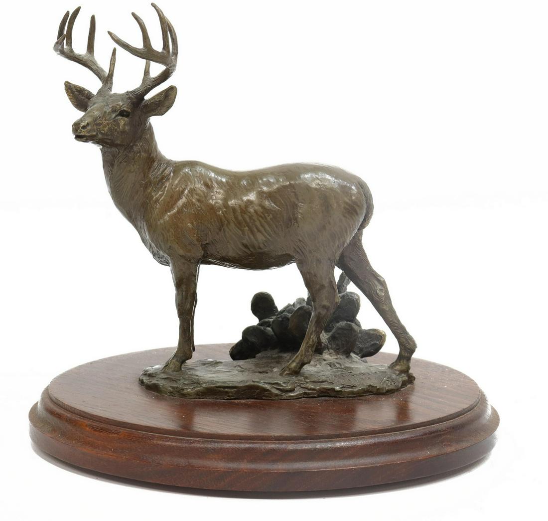 TOM TISCHLER (B.1950) BRONZE, 'SOUTH TEXAS BUCK': Patinated bronze sculpture, "South Texas Buck," signed Tom Tischler (Austin, Texas, b.1950), dated 1980, numbered 15/ 25, mounted to rotating wood base, approx 8"h, 8.5"w, 6"d, 4.3lbs Start Price: $20