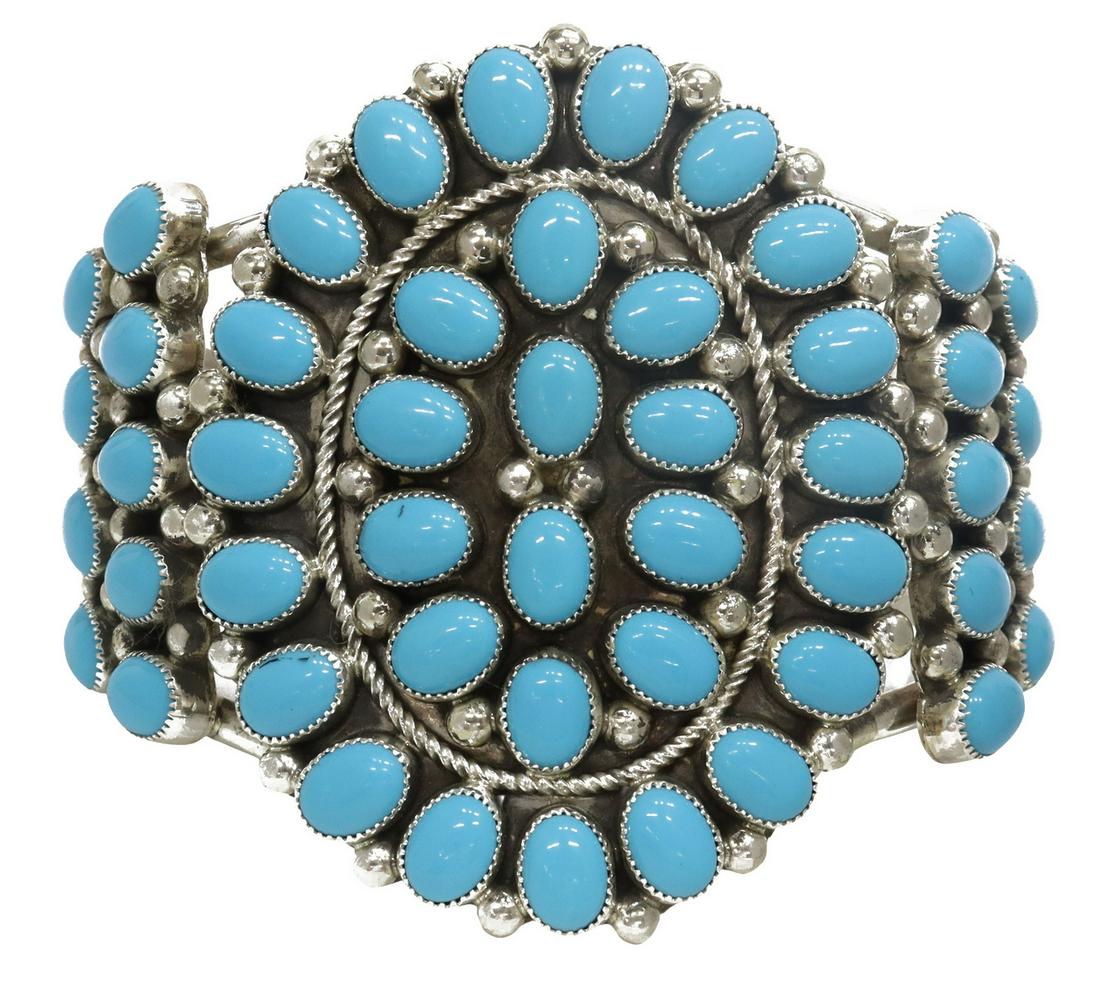 KATHLEEN CHAVEZ NAVAJO STERLING & TURQUOISE CUFF: Native American sterling silver and turquoise cluster cuff, signed Kathleen C (Kathleen Chavez, Navajo/Dine, 20thc.), radiating clusters of turquoise set within serrated bezels, on a split shank cuff,