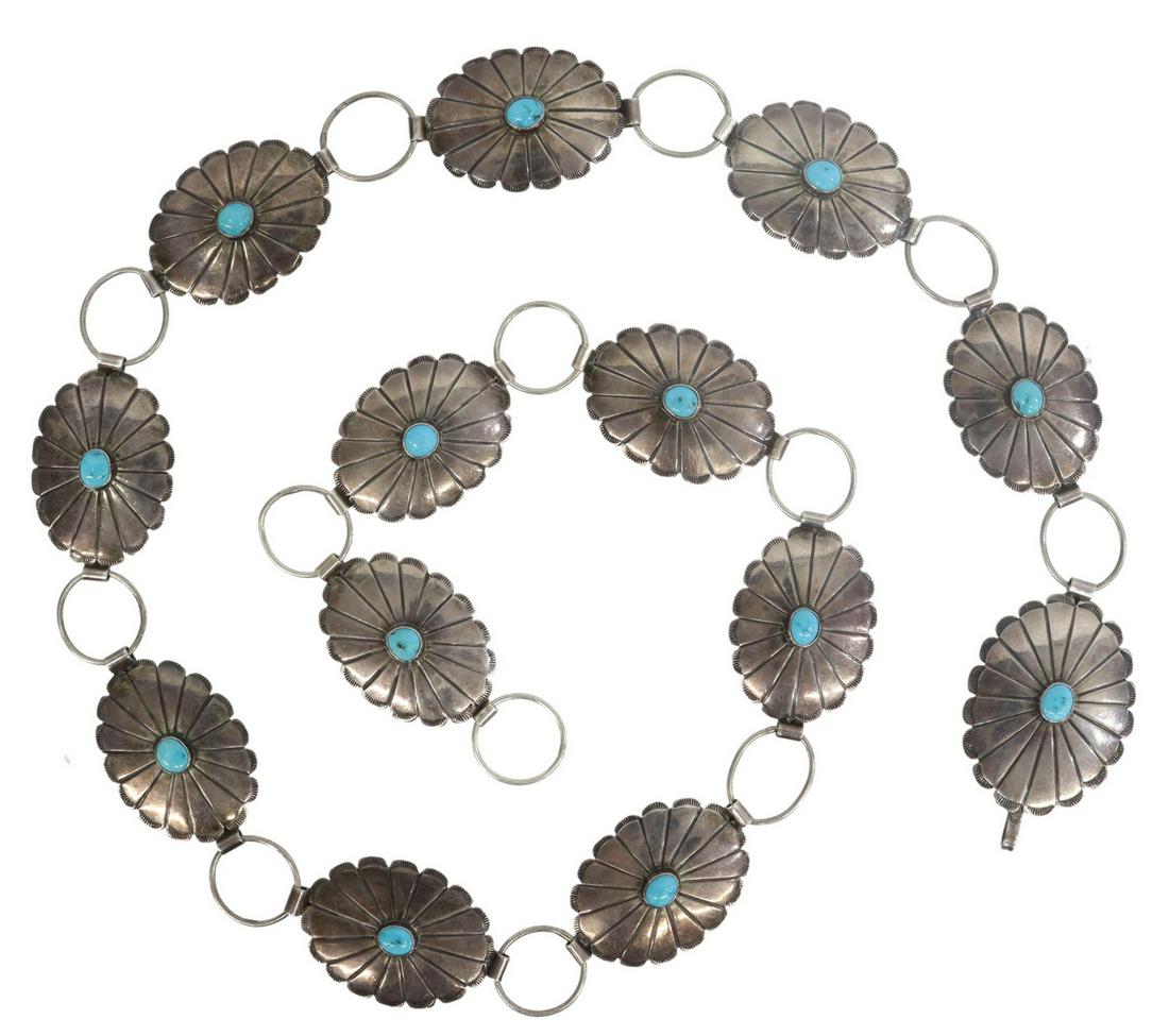 NATIVE AMERICAN TURQUOISE STERLING CONCHO BELT: Native American sterling silver concho belt, stamped SC, likely Navajo, comprising (13) conchos, each with central turquoise cabochon, spaced by silver ovals, approx 37.5"l, 5.69ozt (inclusive of all 