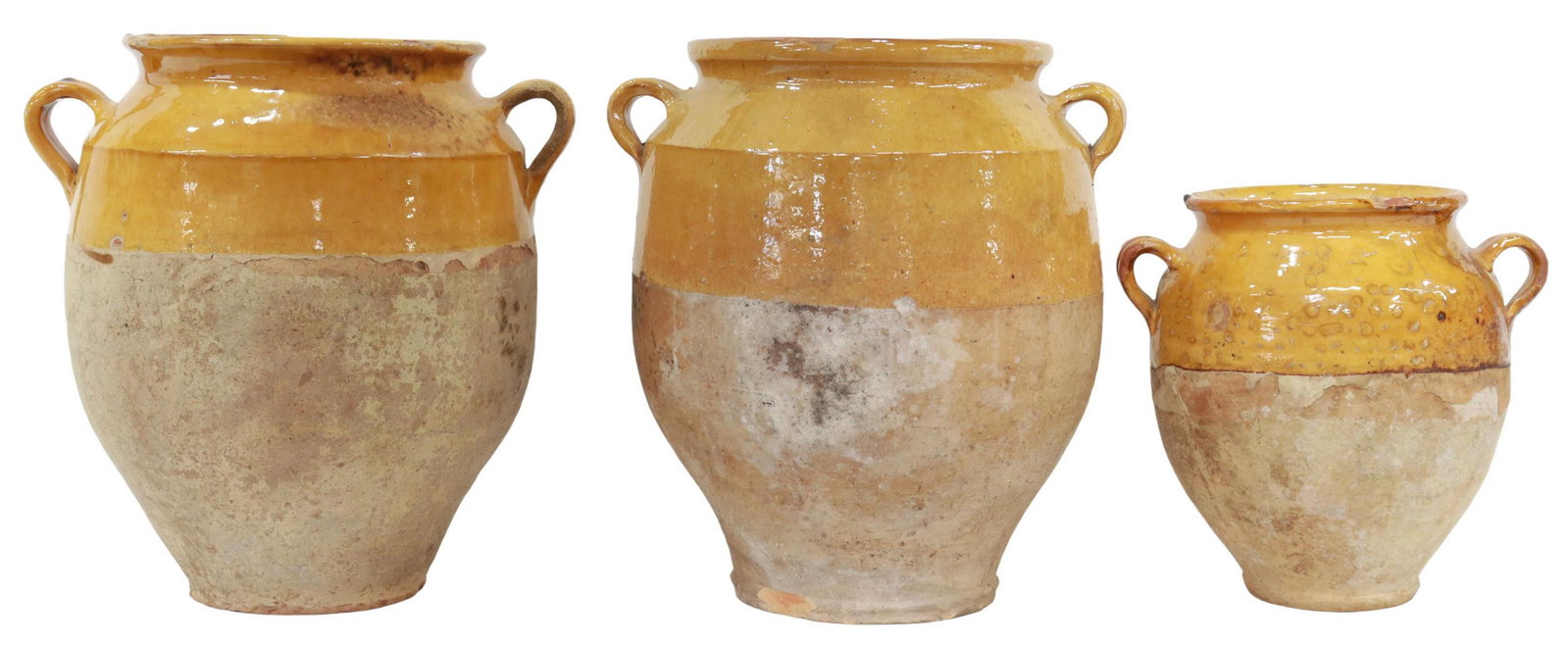 (3) FRENCH OCHRE GLAZED EARTHENWARE CONFIT POTS: (lot of 3) French Provincial earthenware confit jars, with ochre-glazed rim, pulled handles, typical glaze losses, small chips, largest: approx 12.25"h Start Price: $150.00