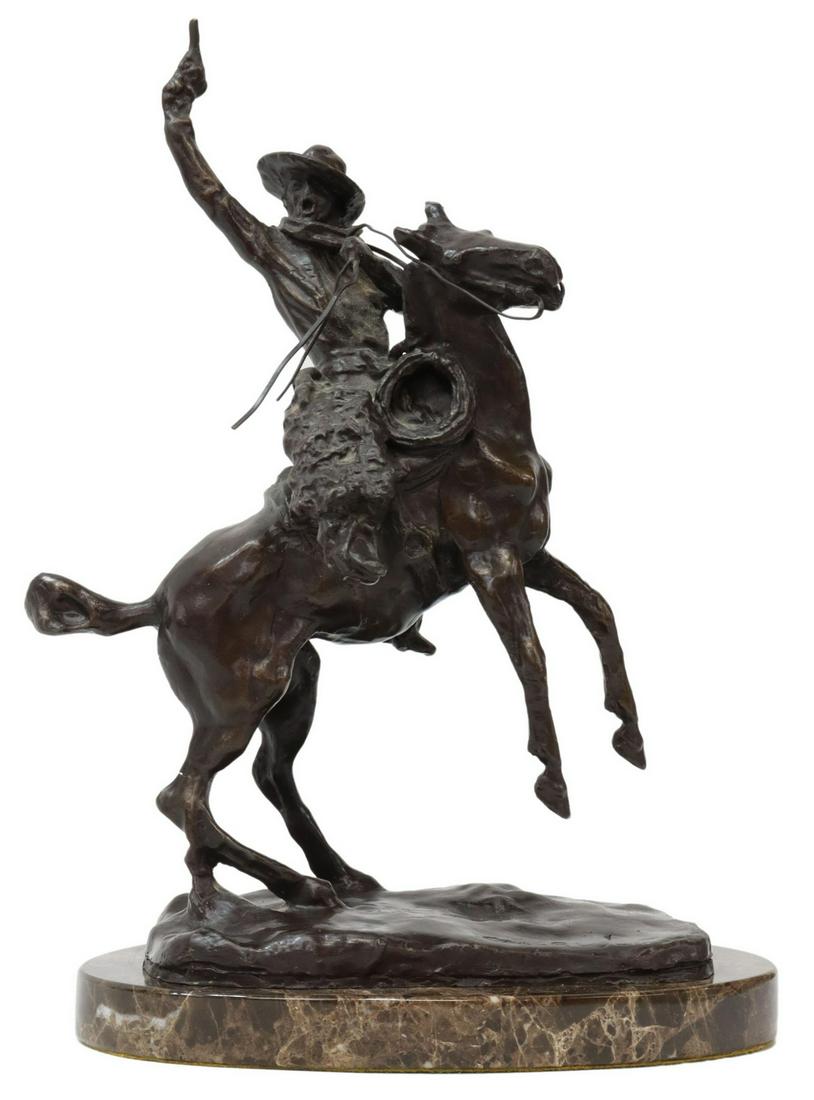 AFTER C.M. RUSSEL (1864-1926) SMOKIN' UP BRONZE: Patinated bronze sculpture, "Smokin' Up," signed in cast after C.M. Russel (Charles Marion Russell, American, 1864-1926), rising on oval marble base, approx 14"h, 9"w, 6.5"d, 13.75lbs Start Price: $10