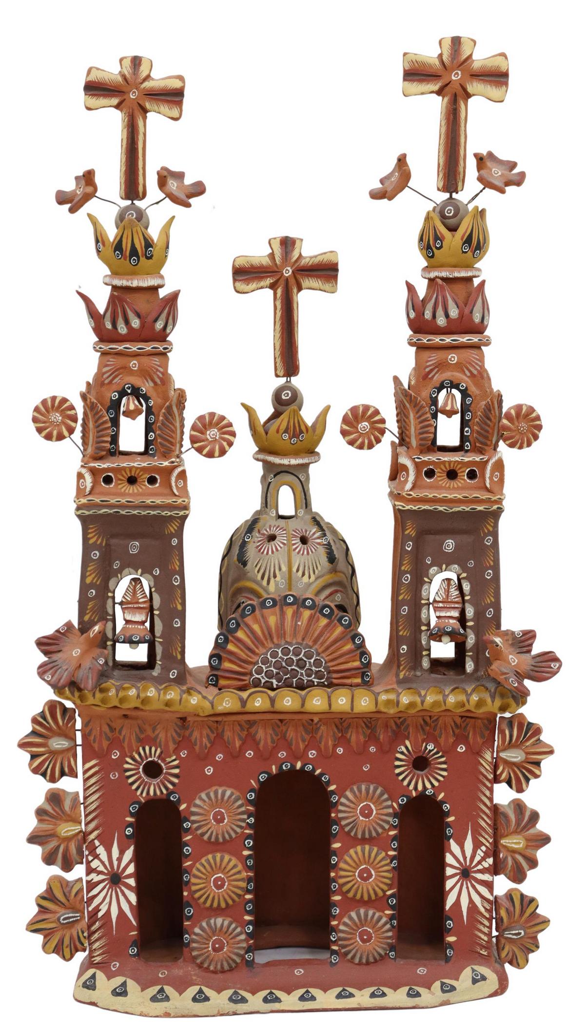 MEXICAN FOLK ART HAND-PAINTED CHURCH LUMINARIA: Large Folk Art terracotta luminaria/ candle lantern, Mexico, slab built and hand painted pueblo church with two bell towers, arcade windows, surmounted by crosses, applied birds and flower, approx 32"