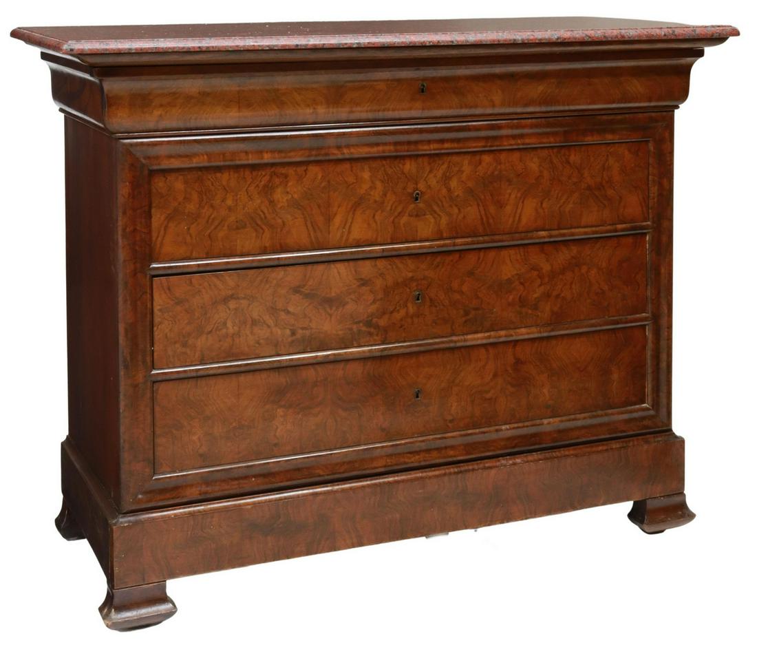 FRENCH LOUIS PHILIPPE GRANITE-TOP WALNUT COMMODE: French Louis Philippe period burled walnut commode, mid 19th c., granite top, ogee frieze drawer with divided interior, over four additional drawers, lowest concealed in base molding, rising on bracke