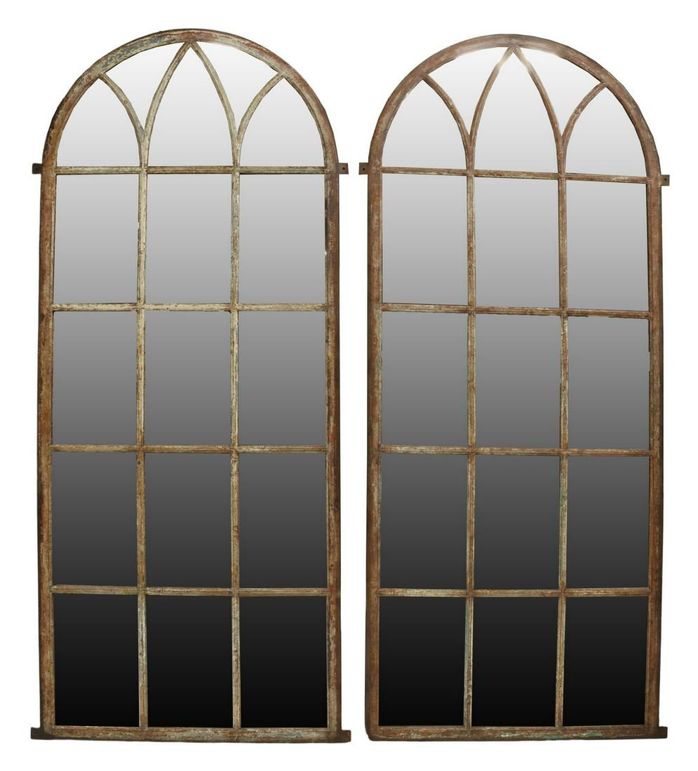 (2) FRENCH GOTHIC REVIVAL IRON WINDOW MIRRORS: (pair) Large French Gothic Revival architectural windows, now fashioned as mirrors, arched iron frame with tracery bars, flat mirror plates, approx 106"h, 46.25"w Start Price: $1000..00