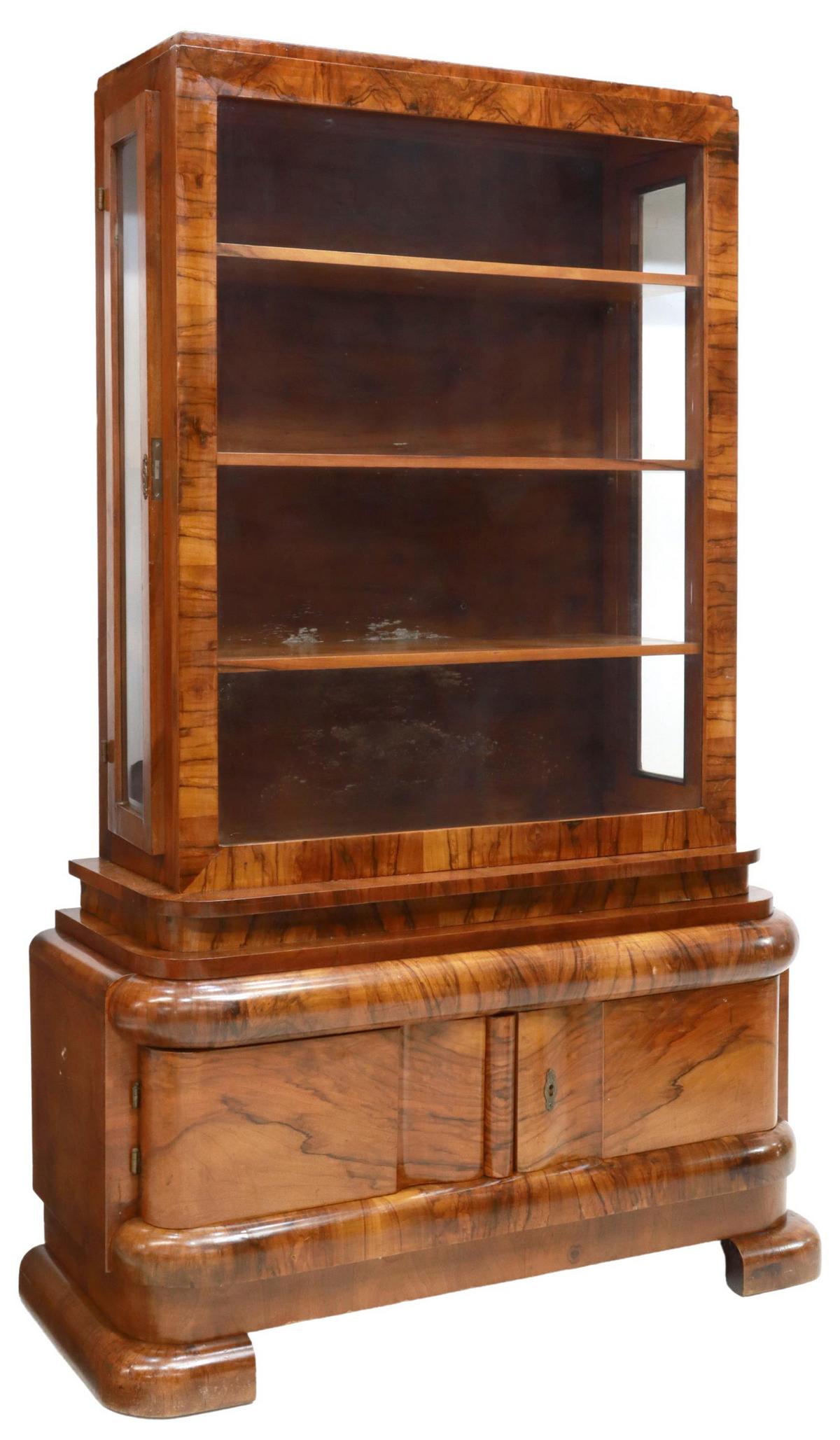 ITALIAN ART DECO BURLED WALNUT VITRINE: Italian Art Deco burled walnut vitrine/ display cabinet, c.1930s, front panel and side access doors with inset beveled glass panes, interior shelves, lower case fitted with double-door cabinet, rising