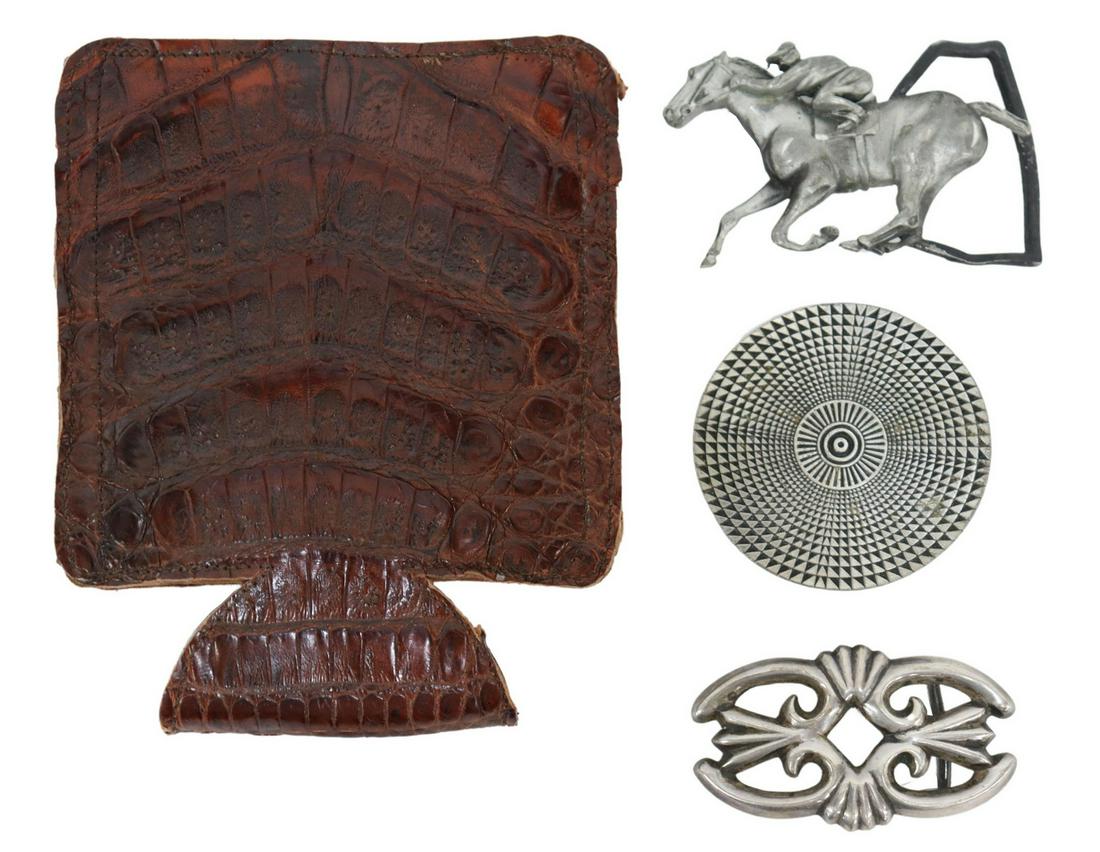 (4) WESTERN BELT BUCKLES & LEATHER KOOZIE: (lot of 4) Western accessories, including: (3) silver tone belt buckles, (one) Bergamot Brass Works, 1974, round geometric pattern, (one) horse and jockey buckle, (one) pierced scrolling design; (1) c