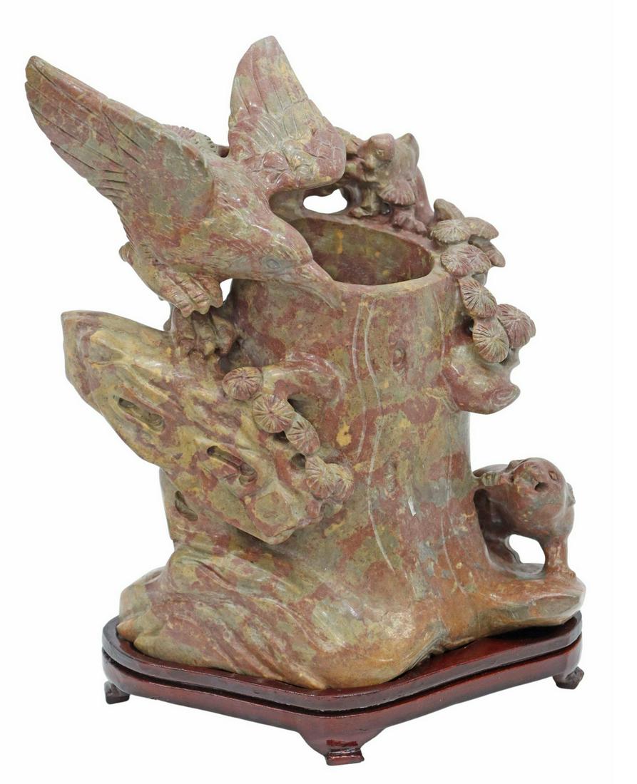 CHINESE CARVED SOAPSTONE BRUSH POT: Chinese carved soapstone brush pot, naturalistic body with carved bird, branch, and rat, rising on wood stand, approx 10.5"h, 6"w, 5"d, 3.6lbs Start Price: $80.00