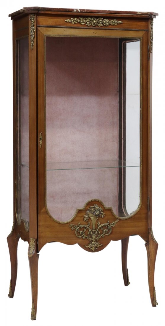 FRENCH LOUIS XV STYLE GILT METAL MOUNTED VITRINE: French Louis XV style mahogany vitrine/ display cabinet, 20th c., having a marble top, over the case with floral & ribbon gilt metal mounts, glazed door and sides opening to an interior glass shelf, l