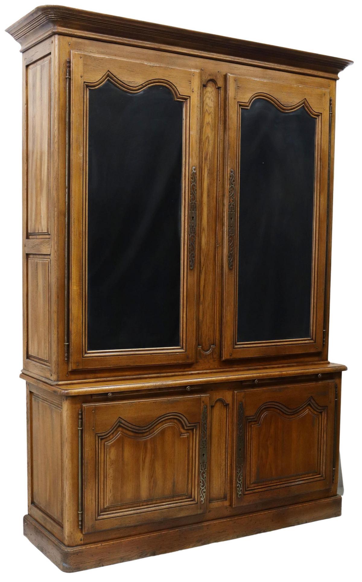 FRENCH RICHELIEU OAK STEPBACK SIDEBOARD: French oak stepback sideboard, Richelieu, late 20th c., molded cornice, upper cabinet doors faced with flat mirror plates, on exterior hinges, opening to lined interior with shelves, two pull-out work
