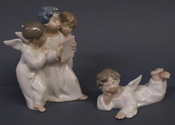 LLADRO PORCELAIN SINGING ANGELS & RELAXING ANGEL: (lot of 2) Lladro porcelain figural group of singing angels together with a single relaxing angel, blacklight examination showing no loss, largest: 7"h, 6"w, 2lbs total