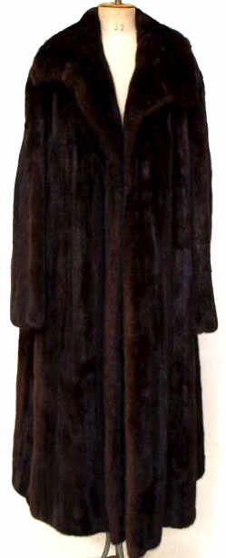 VINTAGE NEIMAN MARCUS MINK COAT: Vintage mink coat, retaining original Neiman Marcus tag, pelt is a bit dried out, right liner detached from sleeve at seam, 48"l, shoulder to shoulder: 17", 5lbs