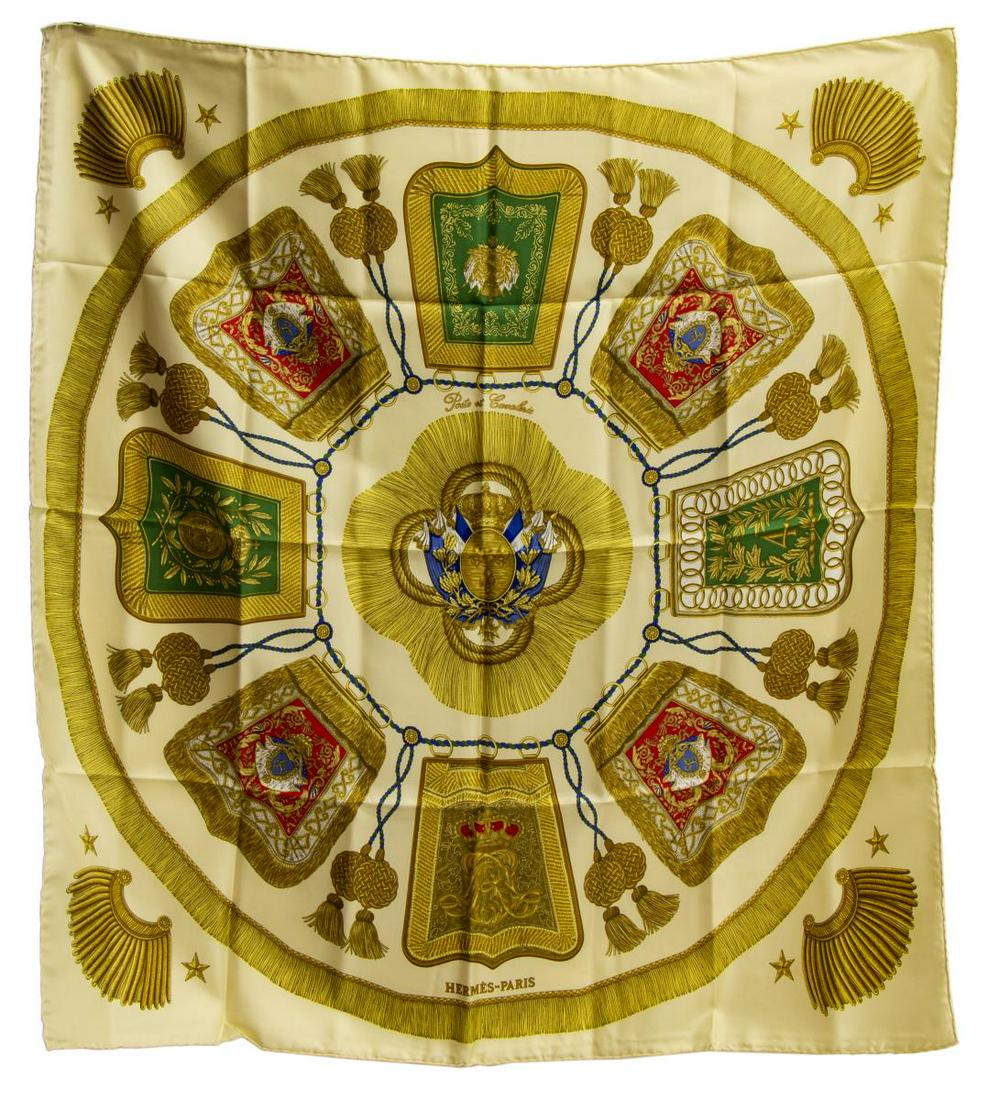 HERMES SILK TWILL SCARF, 'POSTE ET CAVALERIE': Hermes silk twill scarf, "Poste et Cavalerie" pattern, original design by Joachim Metz, light yellow/ ivory ground, with gold sabretache print, retaining care tag, measurements for shipping purposes o