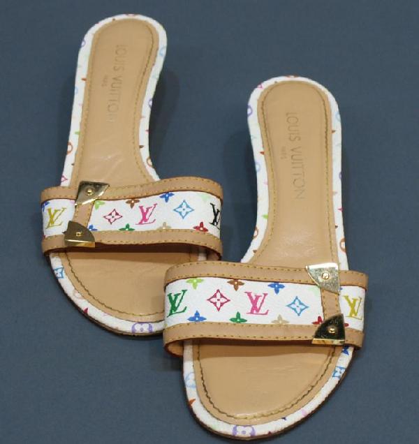LOUIS VUITTON MONOGRAM MULTICOLORE SANDALS: Louis Vuitton monogram multi-color slip-on sandals, size 38 (Italy), 8 (USA), single strap with monogram canvas, leather edging and gold hardware accents, minor wear, especially to bottom, 1.5" heel, 