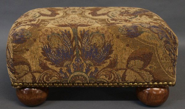 RECTANGULAR FLORAL TAPESTRY CUSHIONED FOOTSTOOL: Rectangular footstool on rounded bun feet with floral tapestry upholstery in brown tones, 8.5"h. 16.5"w 6.5lbs