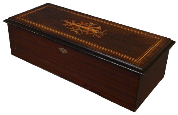 ANTIQUE SWISS EIGHT TUNE ROSEWOOD MUSIC BOX: Antique Swiss rosewood case cylinder music box, eight tunes shown on colorful list affixed at inside of lid, large comb with all good teeth, operating, 5.5"h, 21"w, 9"d, 22lbs