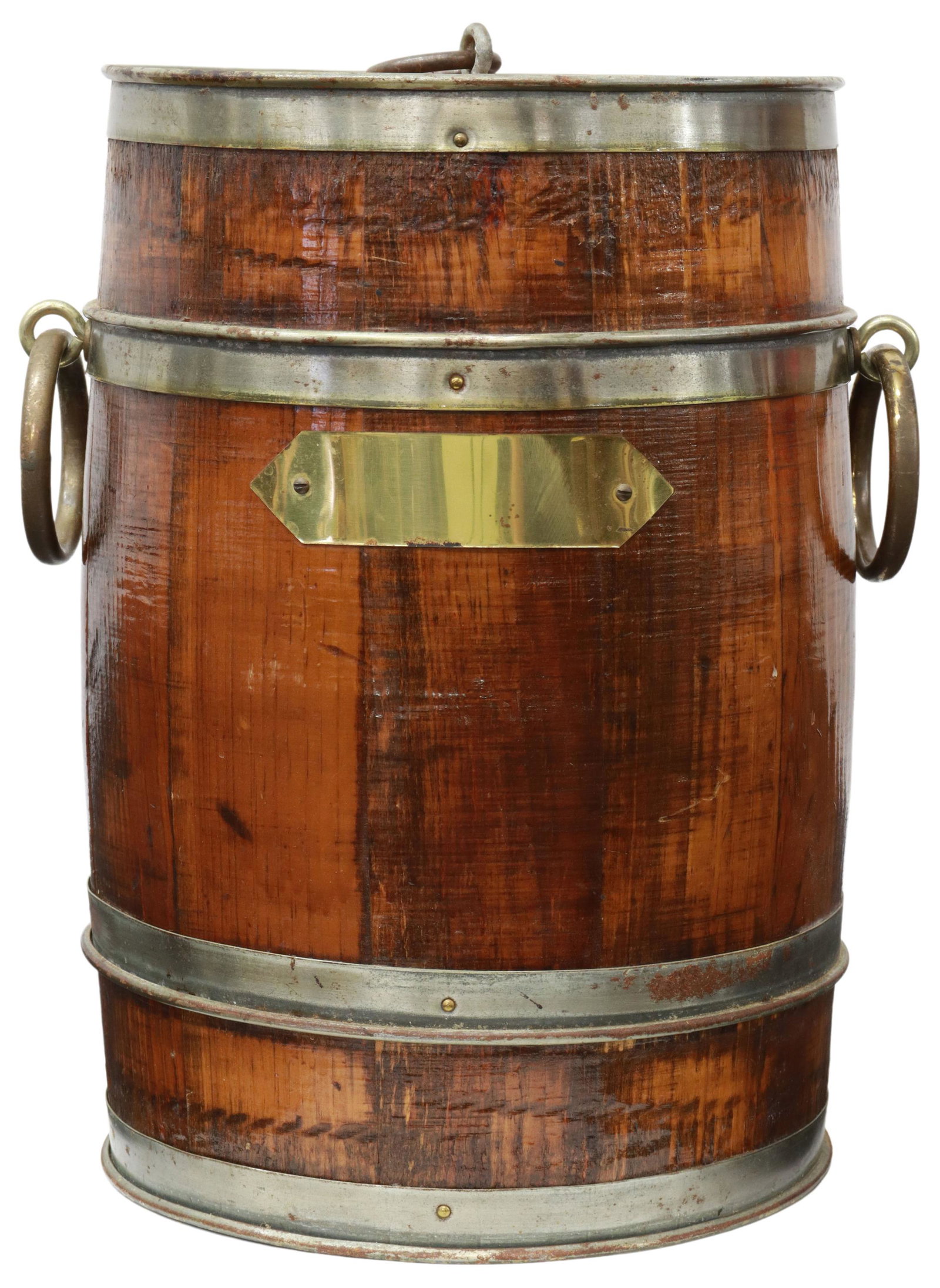 ENGLISH BARREL-FORM BOTTLE COOLER: English barrel-form wine cooler, early 20th c., with metal banding, ring handles, galvanized interior lining, approx 15.5"h, 10.5"diam, 7.75lbs **Provenance: The estate of Mr. Wesley and Mrs. Suzanne 
