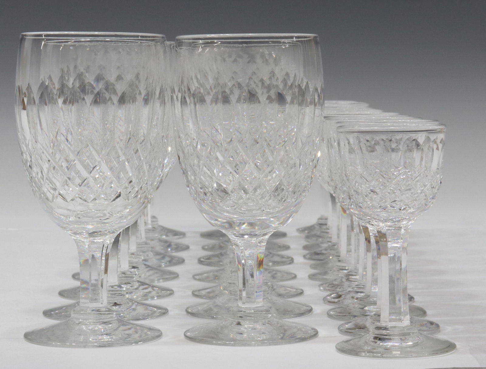 (25) THOMAS WEBB 'NORMANDY' CRYSTAL STEMWARE: (lot of 25) English crystal stemware, Thomas Webb, in the "Normandy" pattern, some with acid-etched mark "S" underfoot, including: (14) water goblets, (three) with chips, approx 5.75"h, 2.75"diam; (11