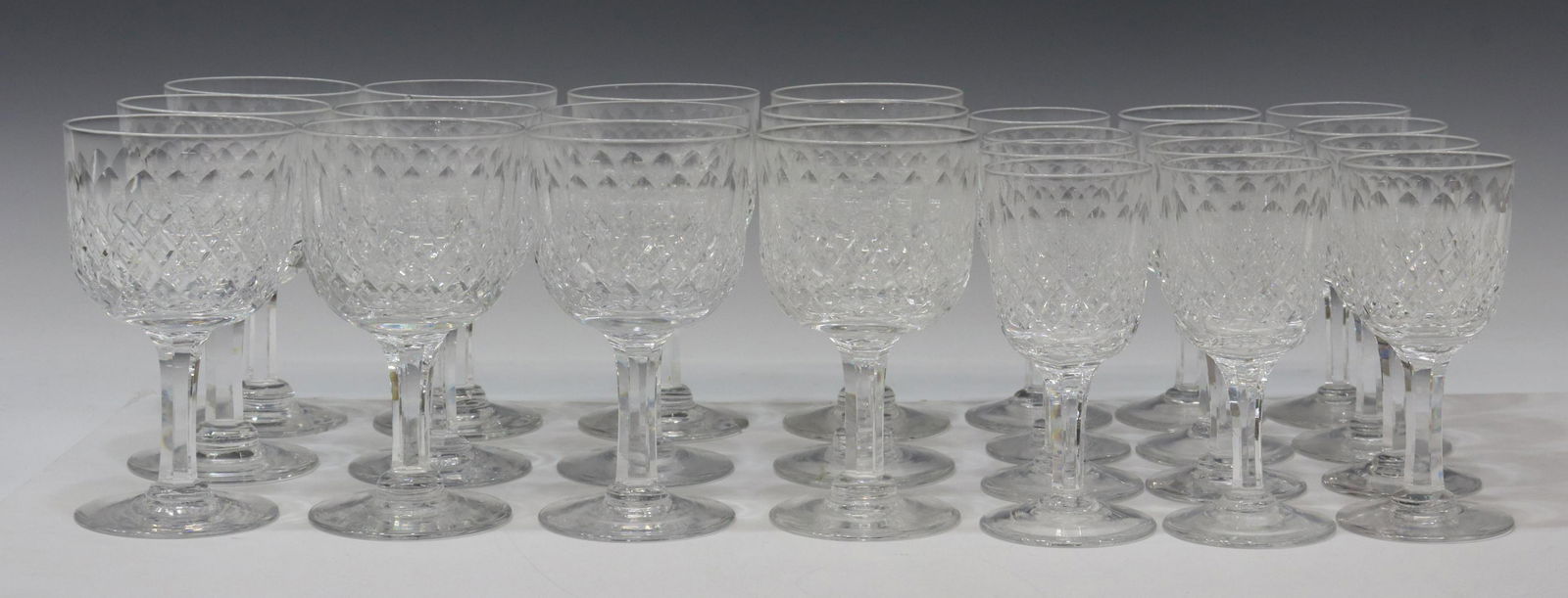 (24) THOMAS WEBB 'NORMANDY' CRYSTAL STEMWARE: (lot of 24) English crystal stemware, Thomas Webb, in the "Normandy" pattern, acid-etched mark 'Thomas Webb' underfoot, including: (12) claret wine glasses, (one) with small rim chip, (one) with small