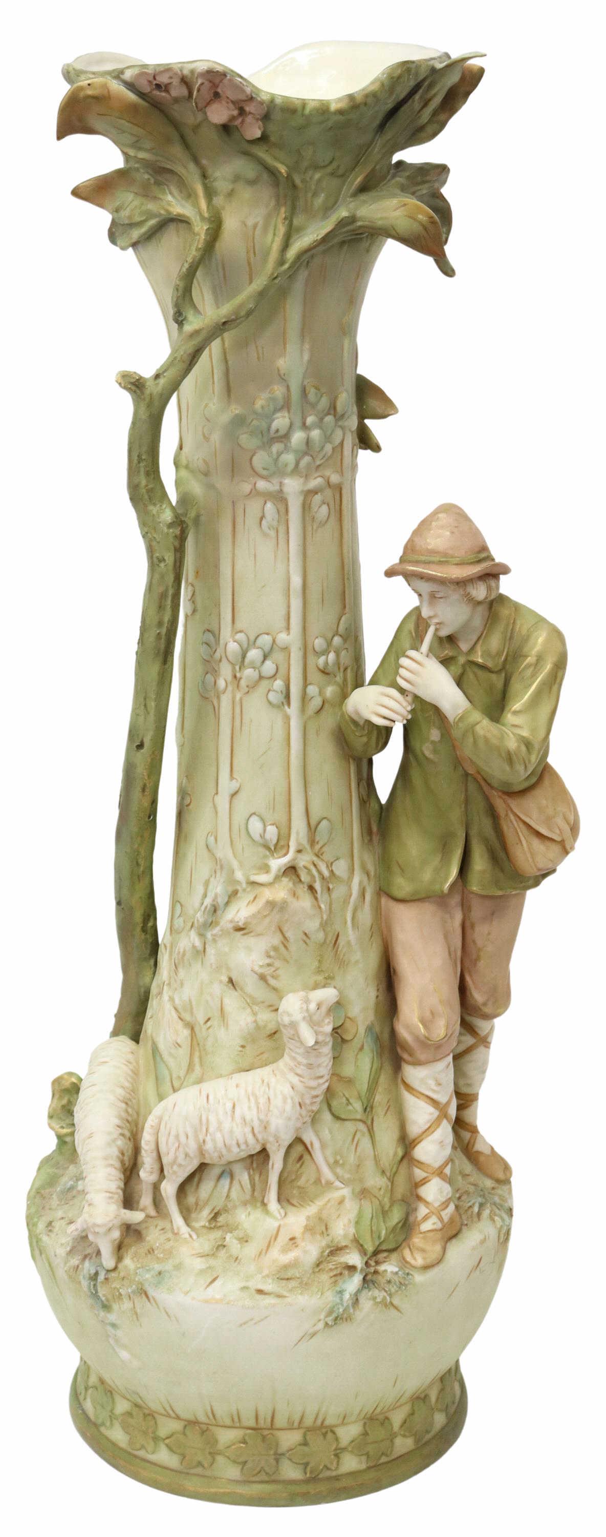 BOHEMIAN ROYAL DUX PORCELAIN SHEPHERD VASE, 27.5"H: Czechoslovakian figural porcelain vase, Royal Dux, early 20th c., depicting a shepherd playing the flute while watching his sheep, with parcel gilt accents, applied pink triangular mark to underside o